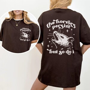 Model wearing Possum Tee in Dark Chocolate.