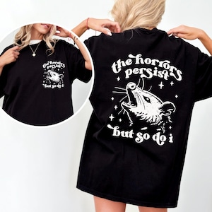 Model wearing Possum Tee in Black.