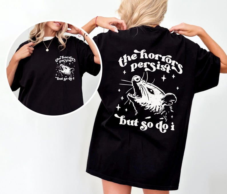 Model wearing Possum Tee in Black.
