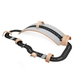 Curvy Board + 16 FLEXIBLE ROAD parts from 100% child safe and durable PVC.