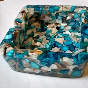 Resin ash tray/trinket holder/soap dish/petri dish/Handmade from clear resin with teal, white, and beige rock and shell pieces