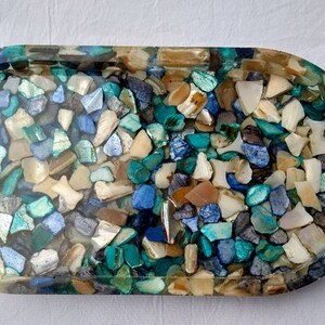 Resin rolling tray/trinket holder/soap dish/Handmade with clear resin and blue, green, white, and beige rocks and shell pieces.