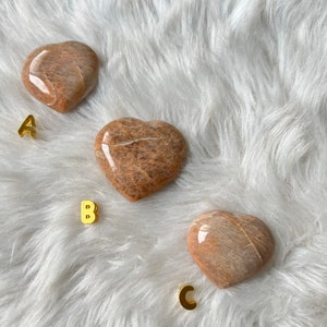 One(1) Peach Moonstone heart, crystal heart carving (you choose)
