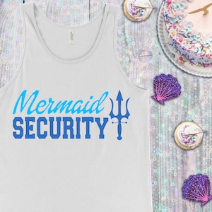 May include: White tank top with the text "Mermaid Security" in blue and a blue trident graphic.
