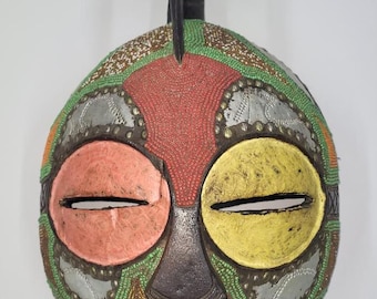 Hand-made African Tribal Mask is 17 inches long by 13 inches wide, African Home Decor, African Art, Tribal Mask, Black People Art.
