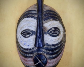 Hand-made African Tribal Mask is 16 inches long by 10 inches wide, African Home Decor, African Art, Tribal Mask, Black People Art.