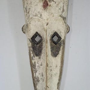 手彫りのアフリカの牙の部族マスク：24x8インチの壁アート