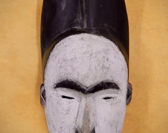 Hand-made African Tribal Mask is 20 inches long by 9 inches wide, African Home Decor, African Art, Tribal Mask, Black People Art.