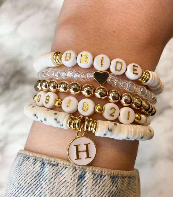 Set of Three Heishi Bead Bracelets Featuring Letter Beads Th (429700)