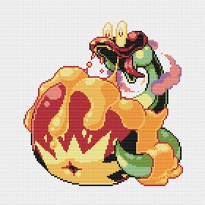 Puede incluir: Una criatura verde y amarilla con una corona roja y un remolino amarillo y rojo a su alrededor. La criatura sostiene un objeto grande, redondo, amarillo y rojo.