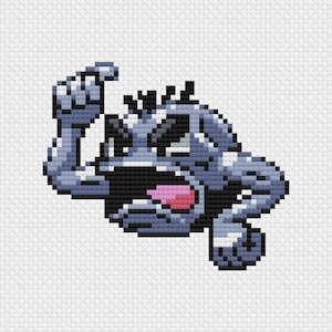 May include: Pixelated cross-stitch design of a gray, rock-like creature with a wide open mouth and a pink tongue. The creature has raised arms and appears to be roaring. The background is white.