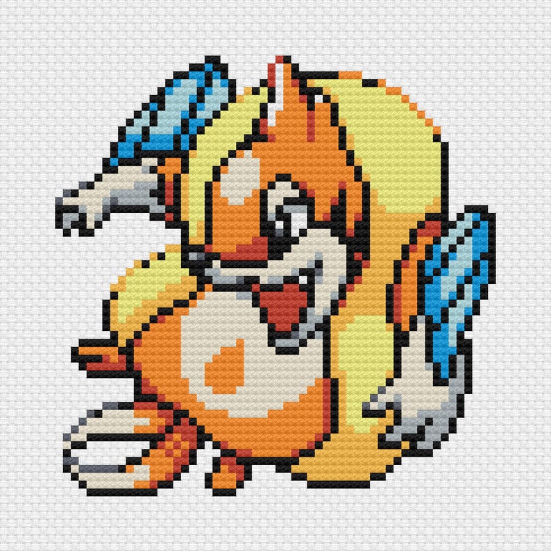May include: A pixelated image of a cartoon squirrel-like creature in shades of orange, yellow, and white, with blue accents. The creature has a smiling expression and is set against a white background, resembling a cross-stitch design.