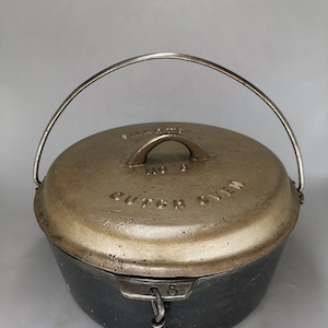 Antique Smart&#39;s No.8 Cast Iron Dutch Oven With Nickle Plated Lid, D10&quot;/H4&quot;, Brockville, Ontario, Canada, sits flat