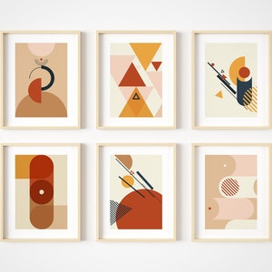 May include: Six framed abstract geometric prints with a color scheme of orange, yellow, red, brown, white, and black. The prints are arranged in a grid pattern on a white wall.