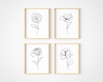 Puede incluir: Conjunto de cuatro impresiones de arte de línea minimalista con ilustraciones florales en blanco y negro. Cada impresión representa una sola flor con un tallo y hojas simples.