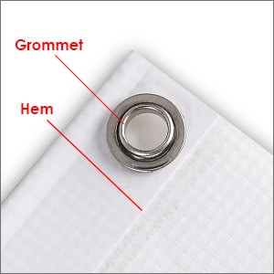 Puede incluir: Primer plano de un dobladillo de tela blanca con un ojal plateado. El ojal es un anillo de metal que se utiliza para reforzar la tela y permitir que se cuelgue.