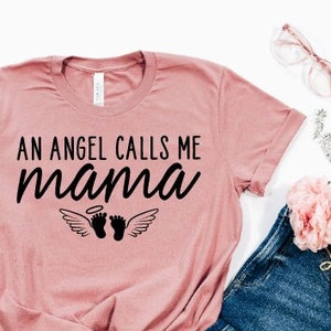ANGEL MAMA TEE Pregnancy and Infant Loss Awareness An Angel Calls Me Mama Grandma Shirt