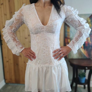 White lace long sleeve ruffle mini dress V-neck