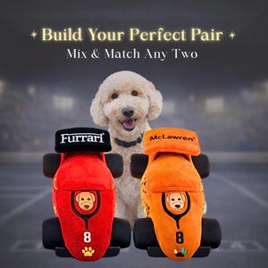 May include: A smiling dog stands behind two plush race car toys. One is red with "Furrarri" on top, the other is orange with "McLawren" on top. Both have a dog face graphic and the number 8.