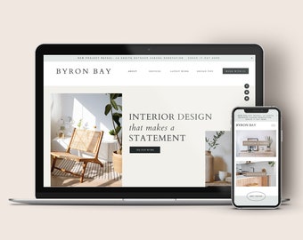 May include: A laptop and smartphone display a website for Byron Bay, an interior design company. The website features images of interior spaces, text that reads "Interior Design that makes a statement," and a navigation bar.