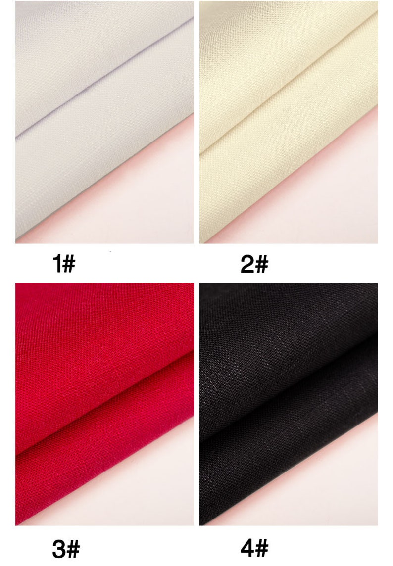 May include: Four fabric swatches in different colors: white, cream, red, and black. The swatches are folded in half and placed on a pink surface.