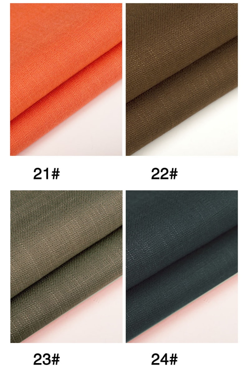 May include: Four fabric swatches in different colors: orange, brown, green, and dark blue. The swatches are folded in half and the fabric has a textured weave.