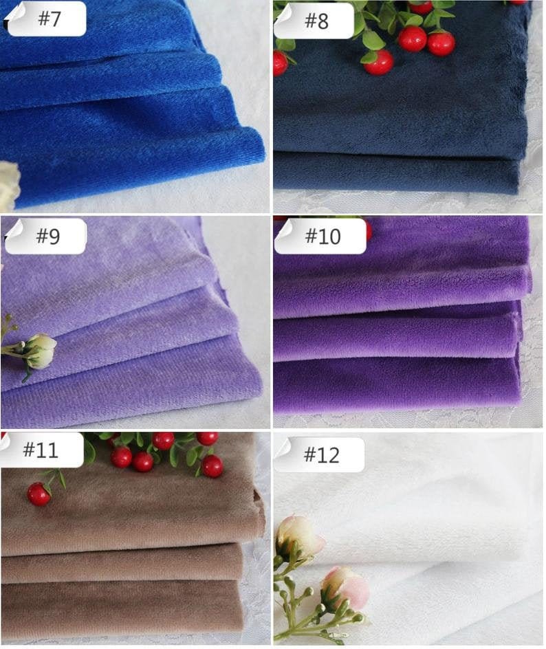 May include: A close-up of six different fabric swatches. The swatches are folded and arranged in a grid pattern. The swatches are in the following colors: blue, navy blue, purple, lavender, brown, and white.