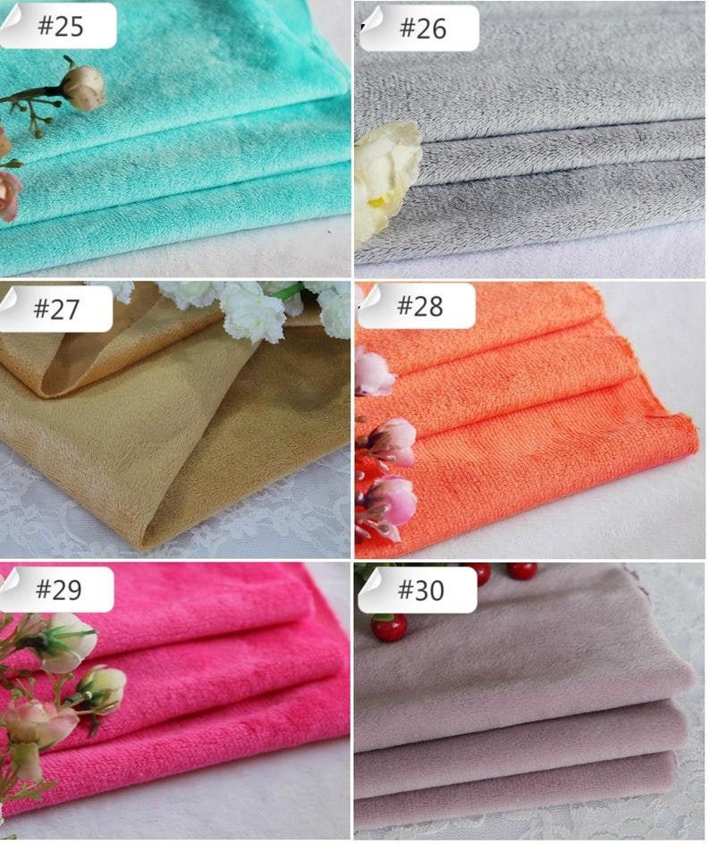 May include: Six fabric swatches in different colors, labeled with numbers 25 through 30. The swatches are folded and arranged in a grid pattern. The colors are turquoise, gray, beige, orange, pink, and purple.