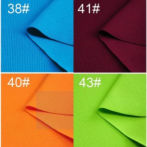 May include: Eight fabric swatches in different colors, including lavender, blue, burgundy, green, red, orange, lime green, and yellow. Each swatch has a number printed on it, ranging from 37 to 44.