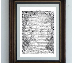 May include: A black and white framed print of a portrait made of text. The portrait is of a person with a serious expression. The text is in a small font and is difficult to read.