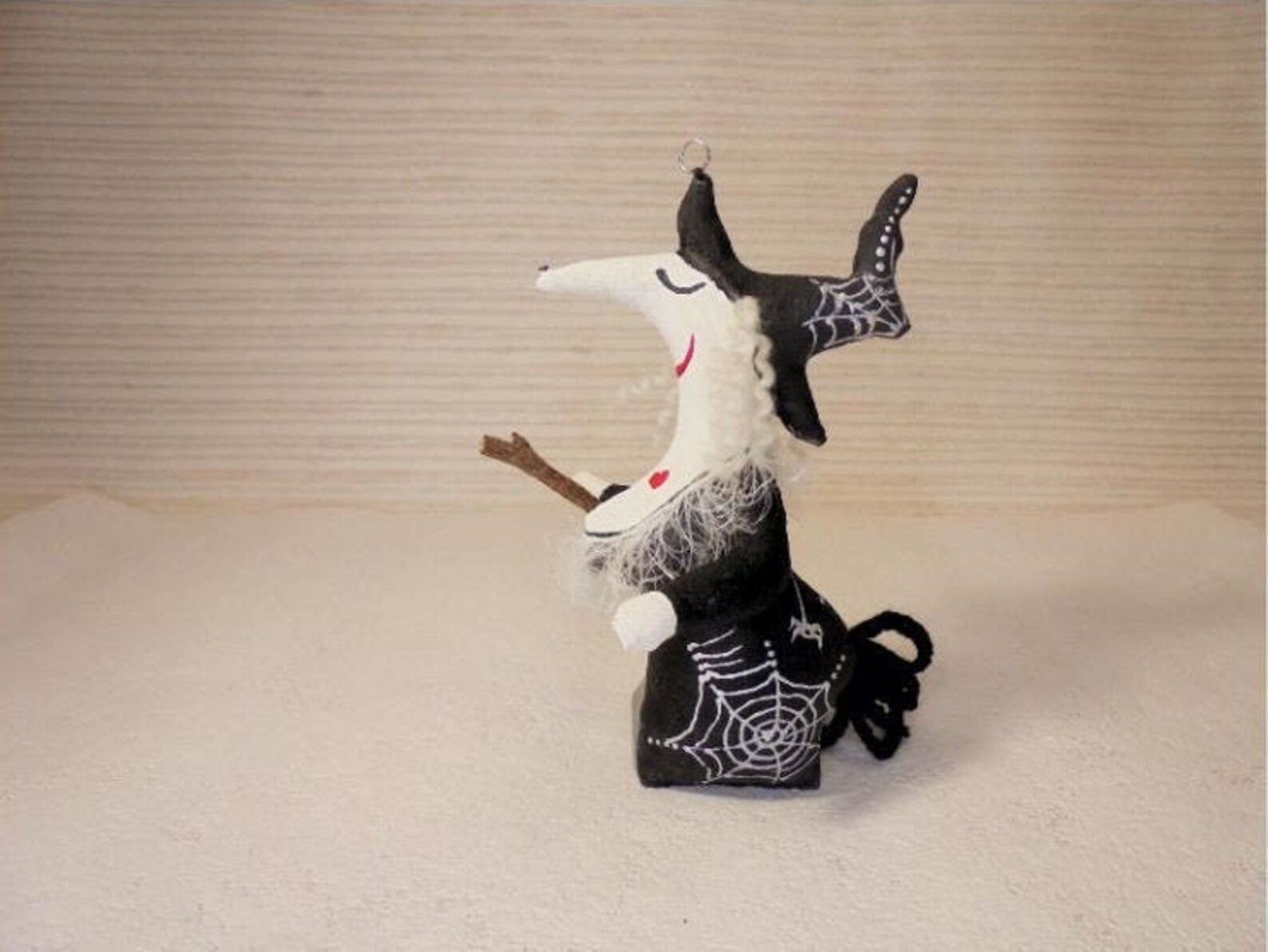 This black colored decorative witch toy is made of Etsy
