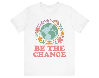 T-shirt "Gentilezza" - Globo floreale pastello, morbido cotone unisex