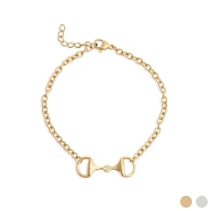 May include: Gold-toned bracelet featuring a horse bit design. The bracelet has a chain link style with a lobster clasp closure. The horse bit is the focal point, adding a touch of equestrian flair to the jewelry.