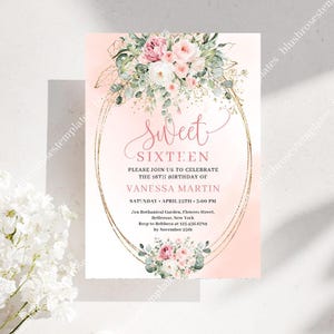 May include: A Sweet Sixteen invitation with a watercolor background in shades of pink. The text includes the words "Sweet Sixteen" in elegant script, along with event details. Floral arrangements in pink and white adorn the top and bottom of the invitation.