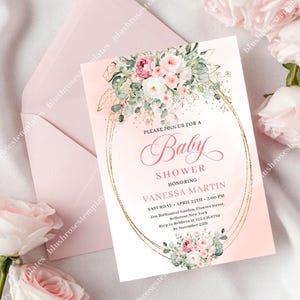 May include: A baby shower invitation with a watercolor design. The invitation features a pink and gold oval frame with floral accents. The text reads "Baby Shower" and includes event details.