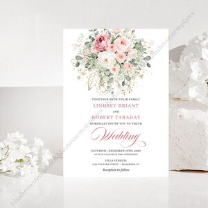 May include: Wedding invitation featuring a floral arrangement of pink and white roses, greenery, and gold accents. The invitation text includes the names Lindsey Briant and Robert Faraday, along with event details. The design is elegant and romantic.