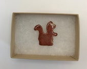 Hand made brooch of a Squirrel.  Porcelain.  A cute gift!