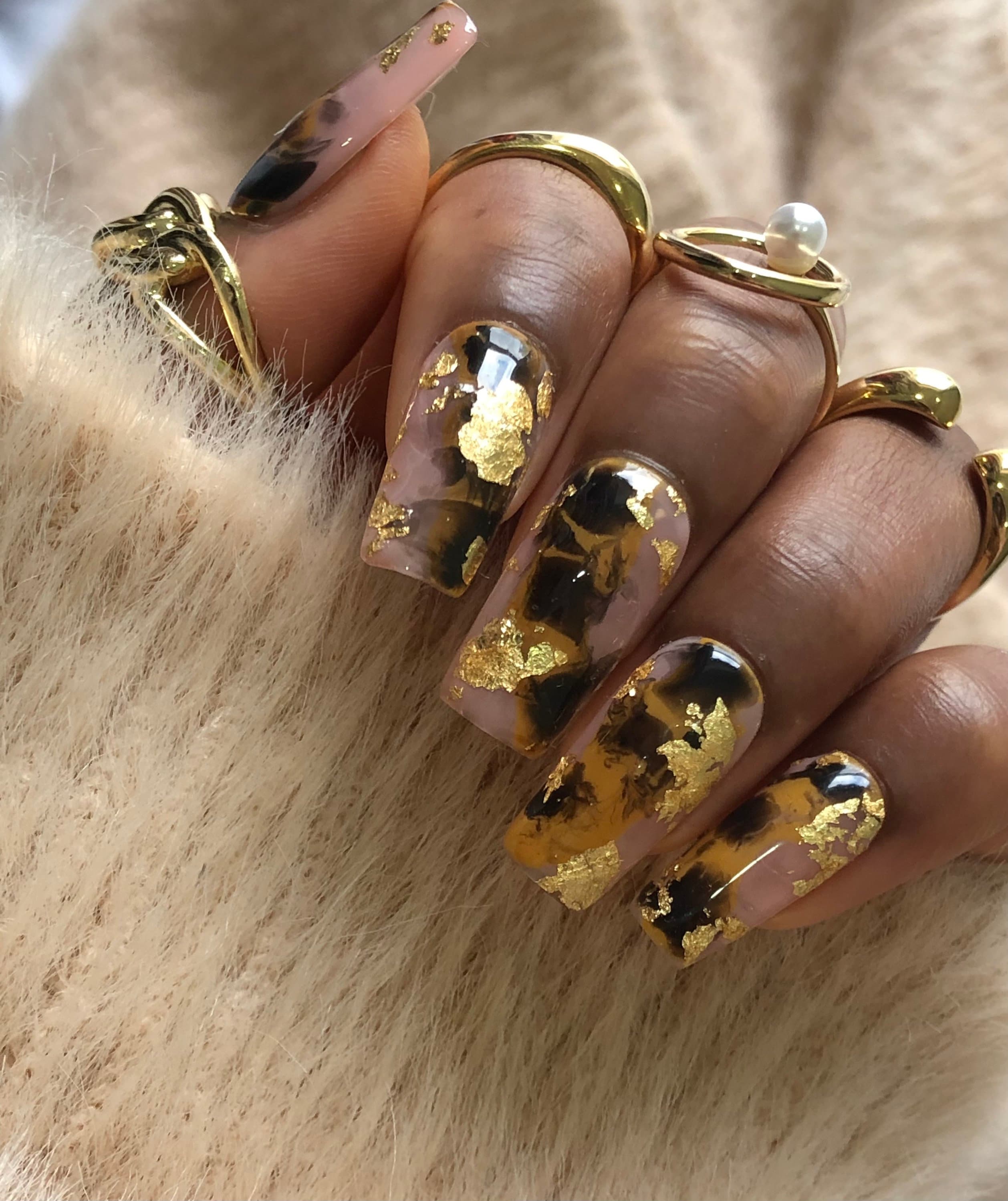 Marble effect with blooming gel and gold foil, took hours but I