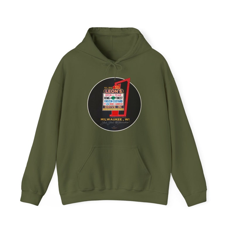 May include: Olive green hoodie featuring a circular graphic with the text "LEON'S" and "OPEN YEAR HOME FINEST FROZEN CUSTARD DRIVE IN" in a retro design. The graphic is in a black circle with red and white accents. The hoodie has a front pocket and a drawstring hood.