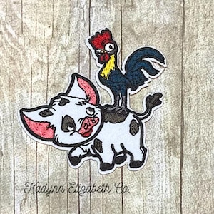 May include: Embroidered patch featuring a cartoon pig with black spots and a red and pink snout, with a rooster perched on its back. The rooster has a red comb and blue feathers. The patch is outlined in black.