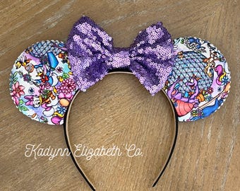 May include: Purple sequin bow headband with a white and pink fabric print of Disney characters and the text "Kadyann Elizabeth Co."
