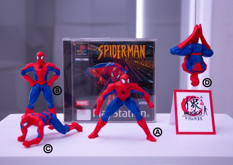 May include: A display of Spider-Man figurines in dynamic poses, featuring red and blue suits. A PlayStation game case with the Spider-Man title is visible. A sign with Japanese text and the word "FIGURES" is also present.