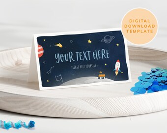May include: A blue and black printable space-themed table card with a rocket, stars, a planet, and the text "Your Text Here" and "Please Help Yourself".