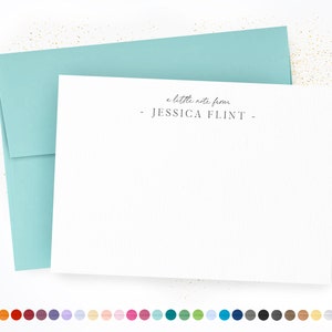 May include: A white card with a light blue envelope. The card has the text "a little note from - JESSICA FLINT -" printed on it.