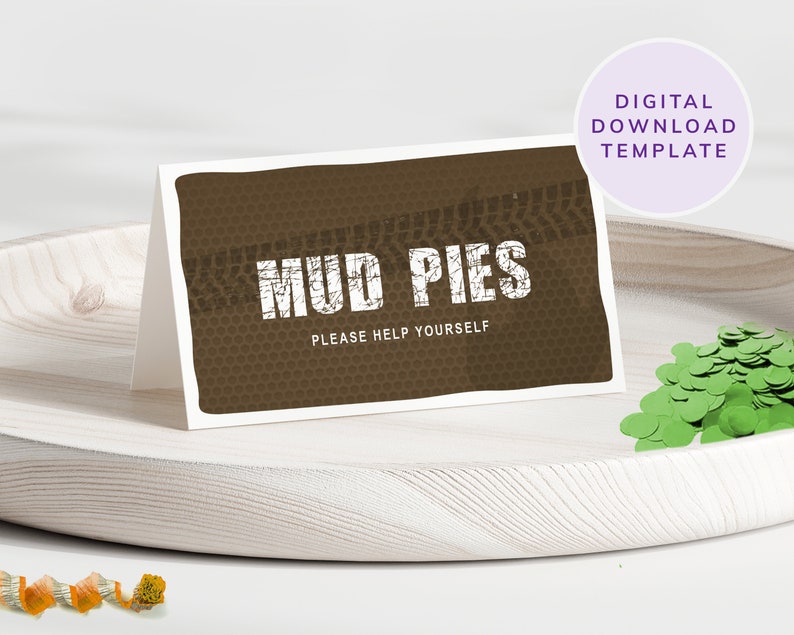 May include: Printable sign with a brown background and a tyre tread pattern. The text "MUD PIES" is in white with a distressed look. The text "PLEASE HELP YOURSELF" is in white below the title.