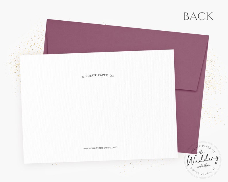 May include: A white card with the text "KREATE PAPER CO." and "www.kreatepaperco.com" printed on it. The card is sitting on top of a burgundy envelope. The envelope has a sticker on the back that says "the Wedding collection" with a logo that says "KREATE PAPER CO."