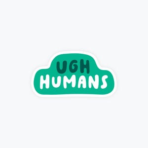 May include: A sticker with a green cloud shape and the words "UGH HUMANS" in white and dark green lettering. The sticker has a white border and is set against a white background.