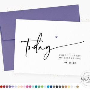May include: A white card with black calligraphy that says "today" and a small purple heart. The text below reads "I get to marry my best friend 05.16.22".