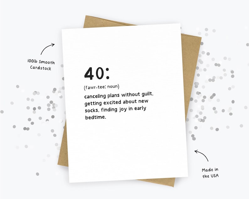 May include: A white greeting card with the number "40:" printed in black, along with a definition. The card is on a brown envelope. The text reads "canceling plans without guilt, getting excited about new socks, finding joy in early bedtime."