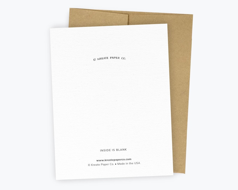 May include: A white greeting card with a brown kraft paper envelope. The back of the card features the text KREATE PAPER CO. at the top, and at the bottom, it reads INSIDE IS BLANK, www.kreatepaperco.com, and &copy; Kreate Paper Co. &bull; Made in the USA.